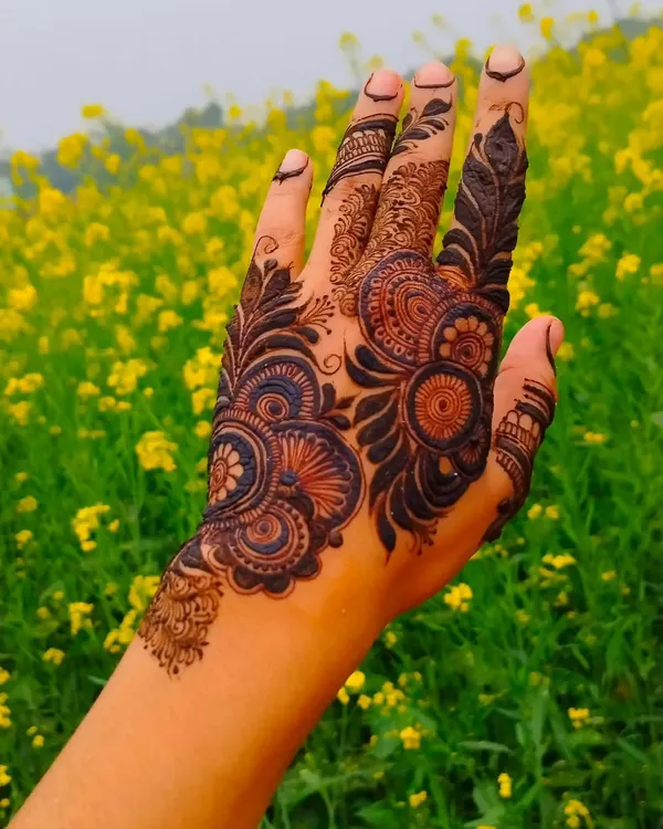 A classic Arabic design with bold floral and paisley motifs against a field of yellow flowers. The contrast is just beautiful.