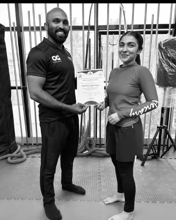 I am proud to present a certificate of achievement to Yusra Akef Siddiqi, a multiple-time National MMA and Grappling Champion. She is a testament to what dedication and hard work can achieve.