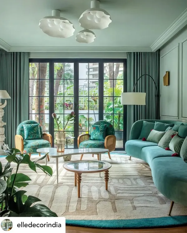 This living room from our 'Summer Haus' project, featured by Elle Decor, embodies our approach to creating vibrant, layered spaces that tell a story. We collaborated with Josmo Studio to craft a cinematic experience, blending bold color, custom furniture, and lush textures to reflect the homeowners' creative spirit.