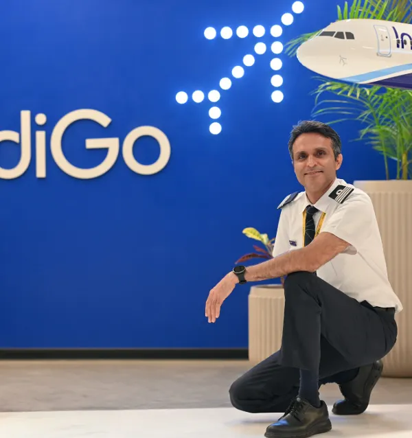 This branding portrait for an IndiGo pilot combines the professional's uniform with the company's distinct branding. The goal was to create an image that feels authentic to both the individual and the corporation they represent.