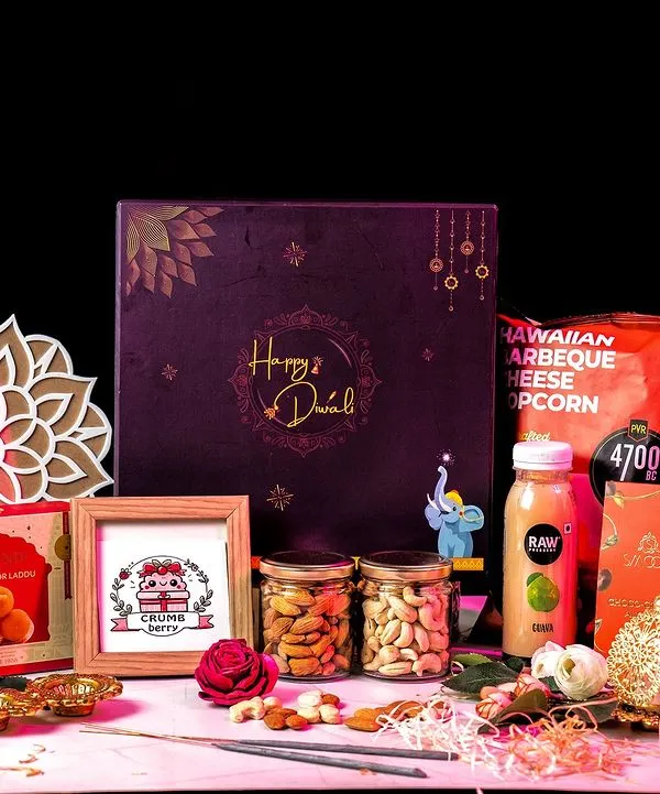We believe a gift should be an experience. This luxurious Diwali hamper is overflowing with a curated selection of gourmet snacks, premium beverages, traditional sweets, and festive decor, all presented in an elegant gift box. It's the perfect high-impact gift to show appreciation to your most valued clients and partners.