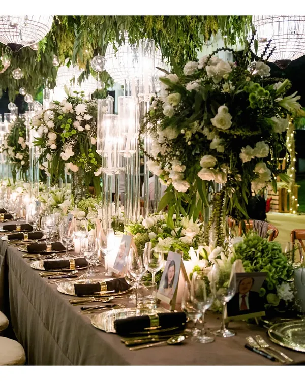 We specialize in creating breathtaking settings for your celebrations. This magnificent long-table setup, adorned with lush florals and elegant lighting, exemplifies the scale and sophistication we bring to every grand dining experience.