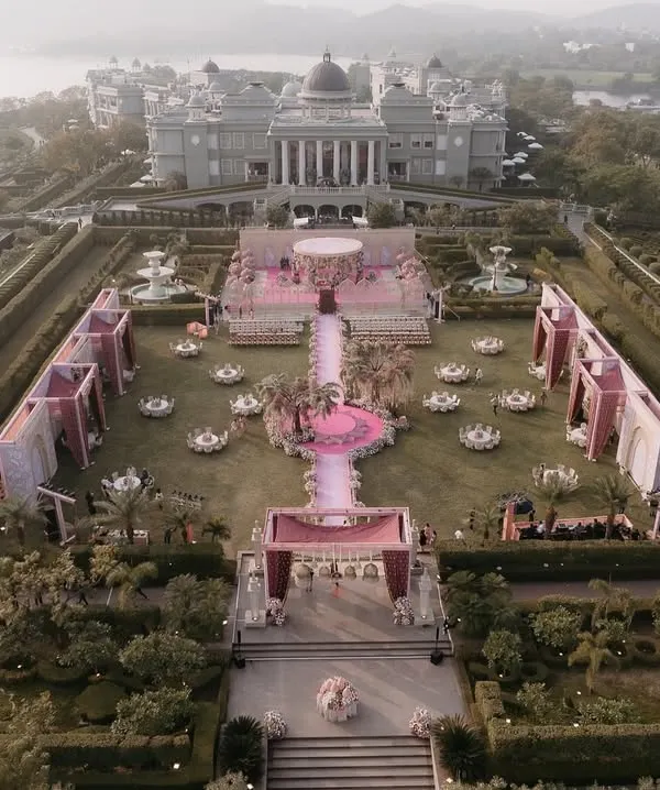 An aerial view of the magnificent Raffles Udaipur, set up for a grand wedding ceremony. We manage the entire layout and logistics to make the most of such spectacular venues.