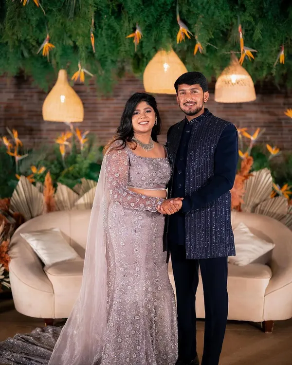 A happy moment for Yeshaswini and Shashank at their boho-chic engagement. The couple's joy is the centerpiece, beautifully framed by our decor of hanging greenery, cane lanterns, and dried palms.