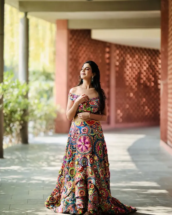 This is the kind of energy and look I bring to every shoot. I specialize in making ethnic wear pop, ensuring your brand's designs are showcased with confidence and style. This vibrant, multi-colored lehenga is a perfect example of the Desi Glam I love.