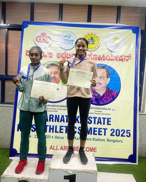 Champions on the podium. Our Under-16 athletes proudly display their gold and silver medals at the Karnataka State Athletics Meet.