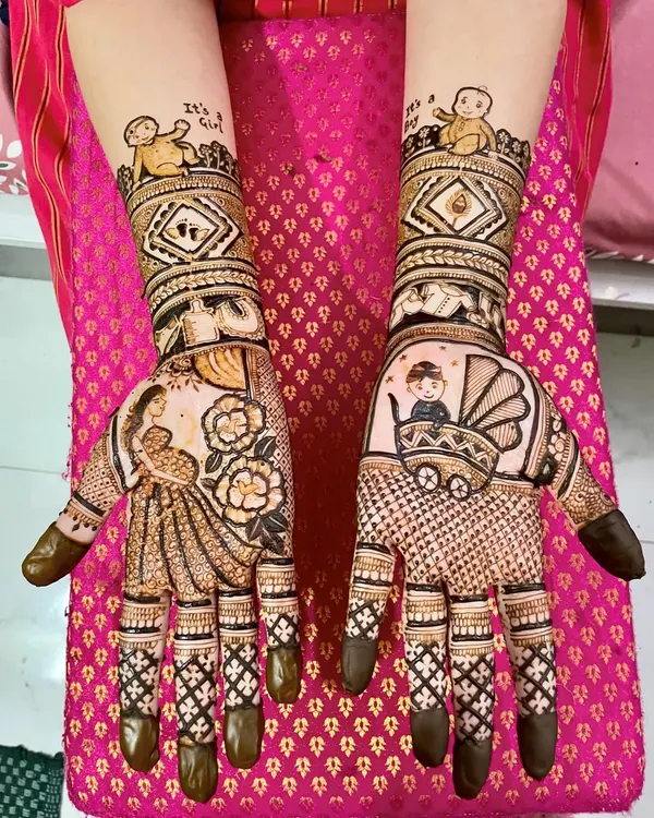 Celebrating a new life with a special baby shower mehendi. This design is full of joy, featuring a mother-to-be, a baby in a pram, and "It's a Girl" text, making it a beautiful and personal way to mark the occasion.