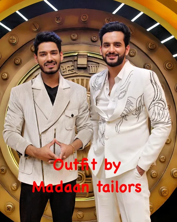 We designed these coordinated modern suits for YouTubers Fukra Insaan and Digvijay Rathee for the show 'Game of Greed'. The outfits feature an embroidered white suit and a structured off-white jacket, showcasing our contemporary design aesthetic.