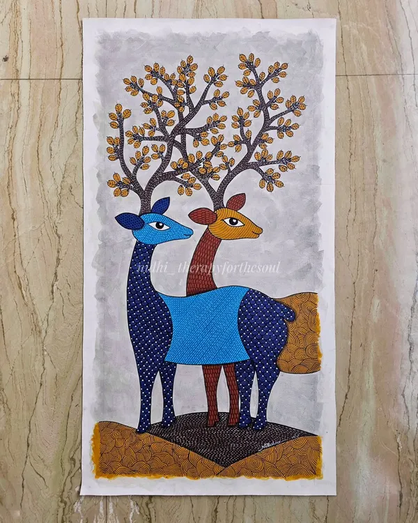 A finished Gond art painting featuring a pair of deer. This piece, created for an architect's project, showcases the fine lines and imaginative patterns typical of this traditional Indian folk art style.