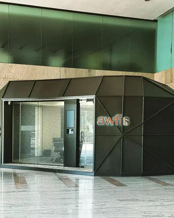 An exterior view of the futuristic smart pod I delivered for Awfis. These mobile meeting rooms are a key part of my commercial automation solution, designed for efficiency and a modern aesthetic in busy office environments.