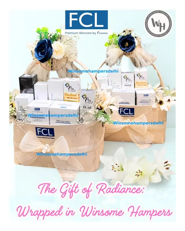 A pair of luxurious skincare hampers created for FCL and Fixderma. Each basket is overflowing with their premium products, adorned with blue and white floral arrangements to match the brand's clinical yet elegant aesthetic.