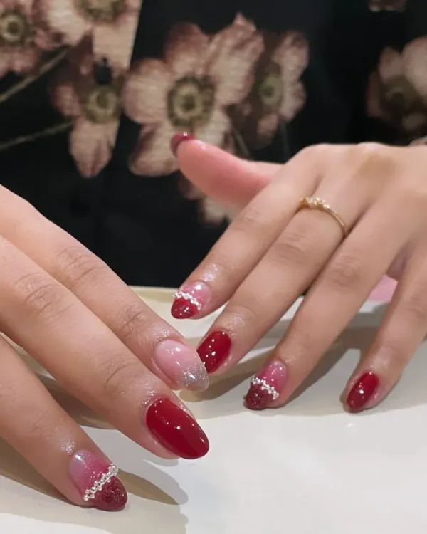 A festive red and pink set with glitter and pearl-like dot accents.