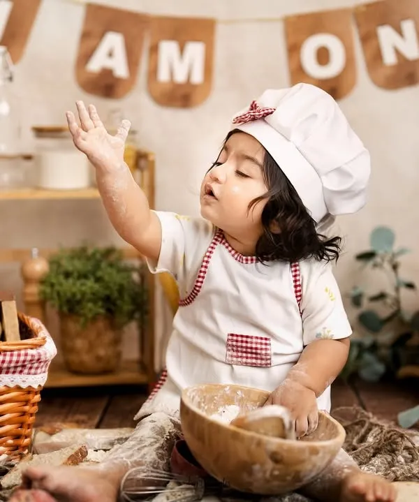 This little baker is celebrating one year by making a glorious mess. The rustic chef theme is a fantastic and fun alternative to a traditional cake smash.
