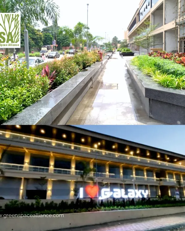 The Galaxy Hub in Ambernath, a dynamic commercial complex we designed. The images show the lively urban plaza with its linear paving and the building's illuminated facade at night, demonstrating how our design has created a go-to destination for local residents.