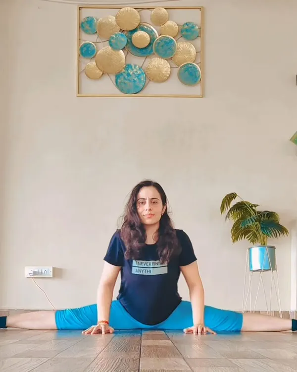 Samakonasana, or the Middle Splits, is a deep stretch for the inner thighs and groin. Achieving this pose requires patience and consistent practice to gradually open the hips.