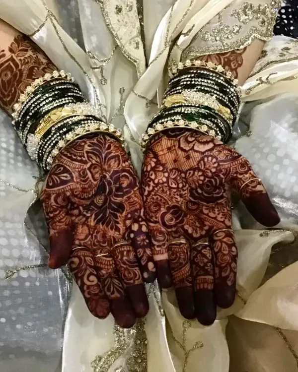This is the result I work for. A stunningly dark and even henna stain on a bride's hands, showing the quality of my natural, chemical-free paste.