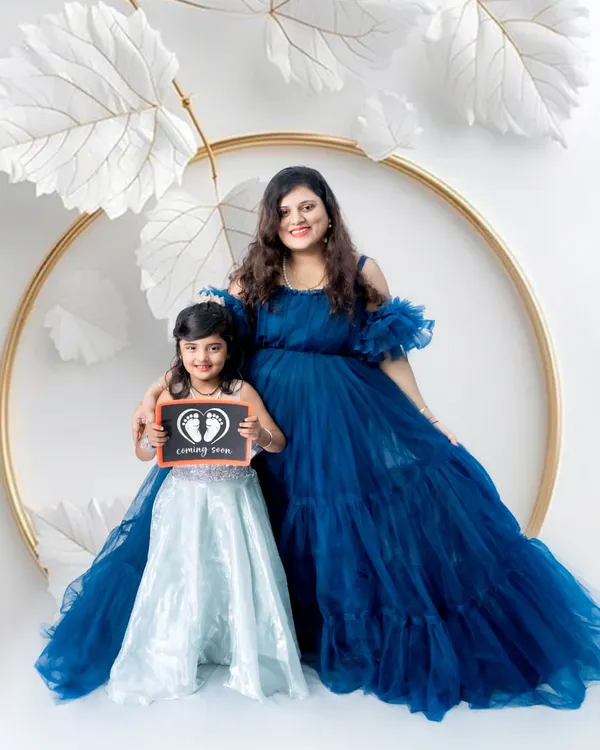 A beautiful maternity portrait with a soon-to-be big sister. It's a joy to capture the excitement of the whole family as they wait for the new arrival.