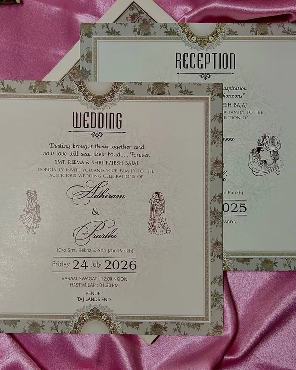 A perfect example of a complete stationery set. The wedding and reception cards share the same elegant typography, floral borders, and classic motifs for a unified look.