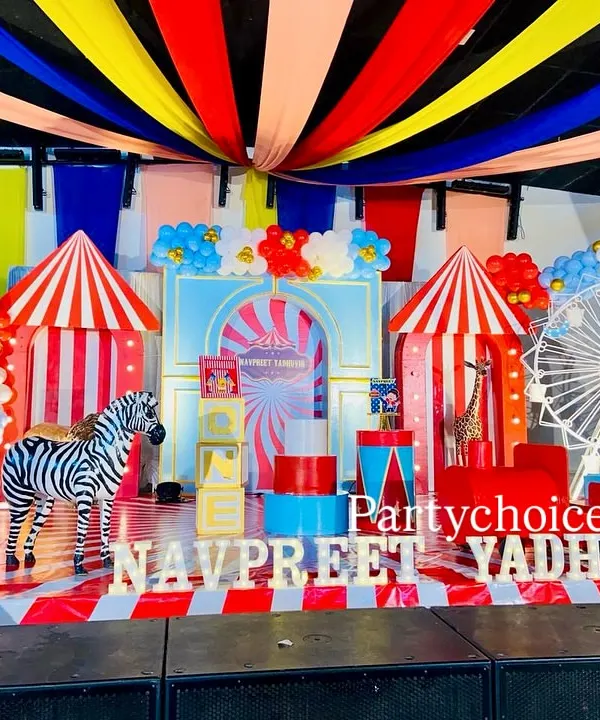 A closer look at our grand carnival theme stage. This view highlights the detailed props, including the carousel horse, letter blocks, and the striped flooring that completes the circus atmosphere.