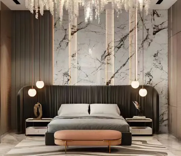 A breathtaking master bedroom design identical to our hero image, showcasing a dramatic marble accent wall and a plush, curved headboard. The combination of vertical integrated lighting and hanging globe pendants creates an atmosphere of pure luxury.