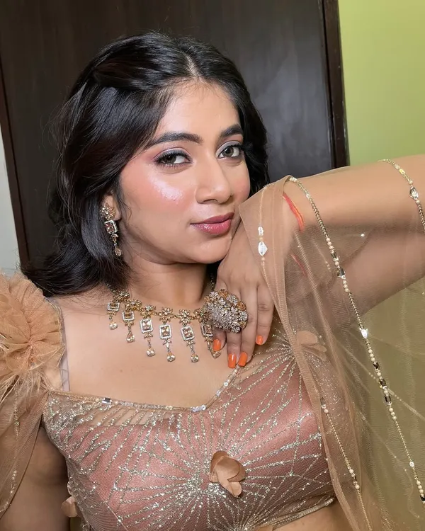 A magical moment from a creative shoot. This look features soft, glowing skin and a shimmery eye, creating a dreamy and romantic bridal aesthetic.