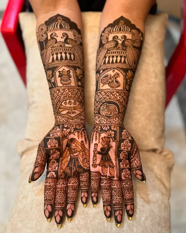 This is a perfect example of a traditional Raja-Rani portrait mehndi. I focus on creating symmetrical, clean lines and figures that tell a story, ensuring the design is both classic and deeply personal for the bride.