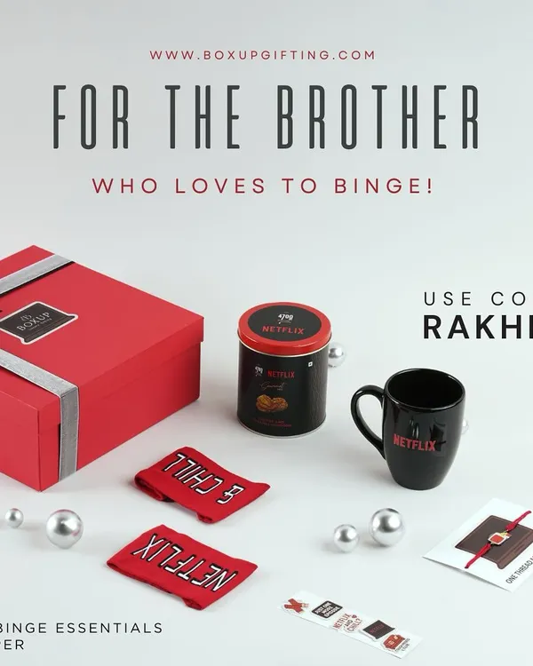 For the brother who loves to binge. Our "Binge Essentials Hamper" is a bestseller, complete with Netflix-themed socks, a mug, popcorn, and of course, a Rakhi.