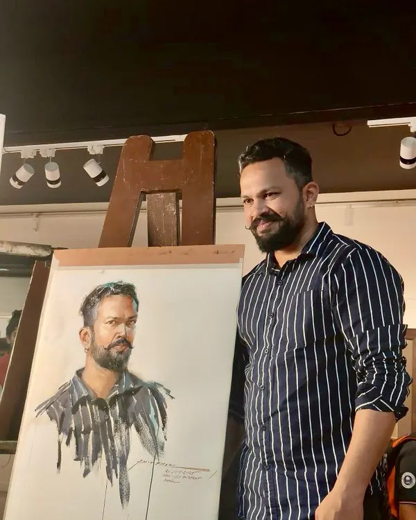 Here I am with my self portrait, created as a live demonstration for Hina Bhatt Art Ventures. It's always a great experience to paint in front of an audience.