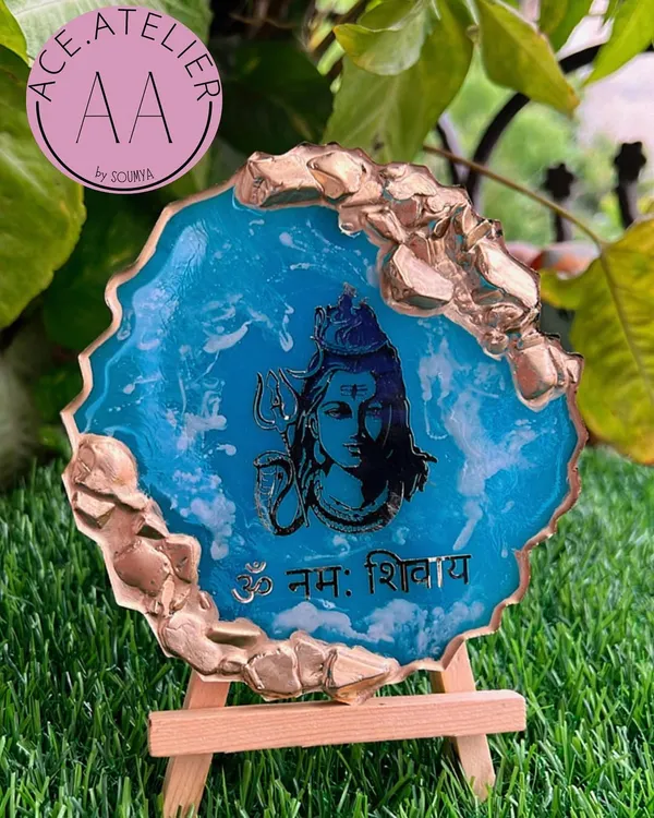 A powerful 'Om Namah Shivay' mantra frame in a striking blue marble resin with a gold geode edge, perfect for any Mahadev devotee.