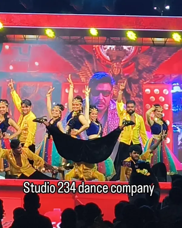 A dynamic moment from our performance at 'The Devil' movie launch event. The choreography includes intricate prop work and expressive group formations, showcasing our team's skill as professional stage performers for corporate functions.