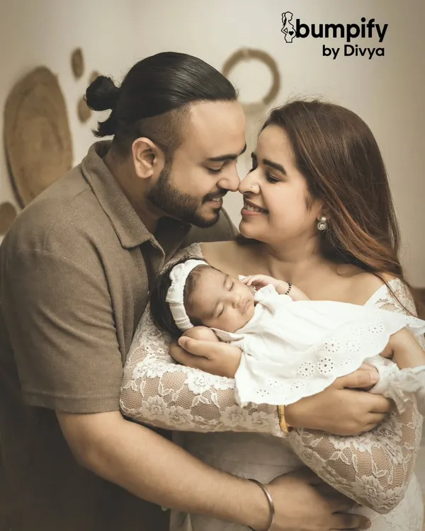 And then there were three. This is the kind of timeless family portrait I love to create, capturing the overwhelming love and tenderness as new parents hold their baby for the first time.