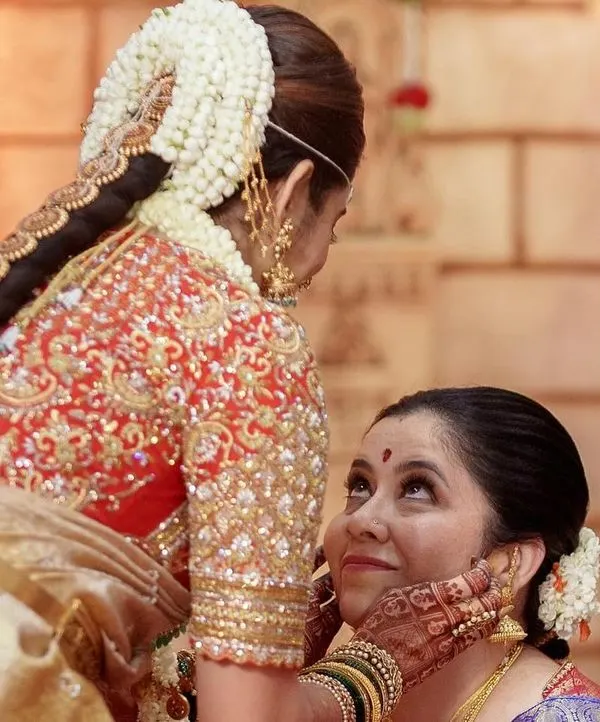 A truly precious moment. Here I am with Sonal on her wedding day. Being a part of these personal milestones and creating the outfits for them is the most rewarding part of my job. Her bridal blouse was a labor of love.