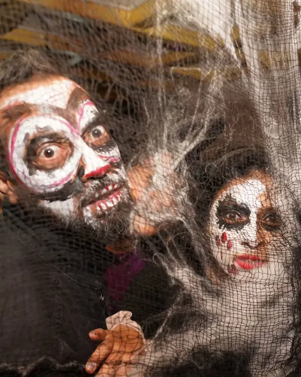 Getting into the spooky spirit for our Halloween party. Sai and I love going all out with face paint and costumes.