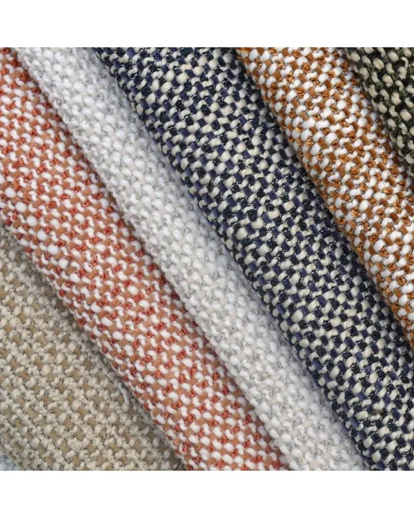 The 'Narla' collection is a textured, vintage-inspired fabric that offers structured sophistication. Its durable weave makes it a perfect and contemporary option for heavy-use upholstery.