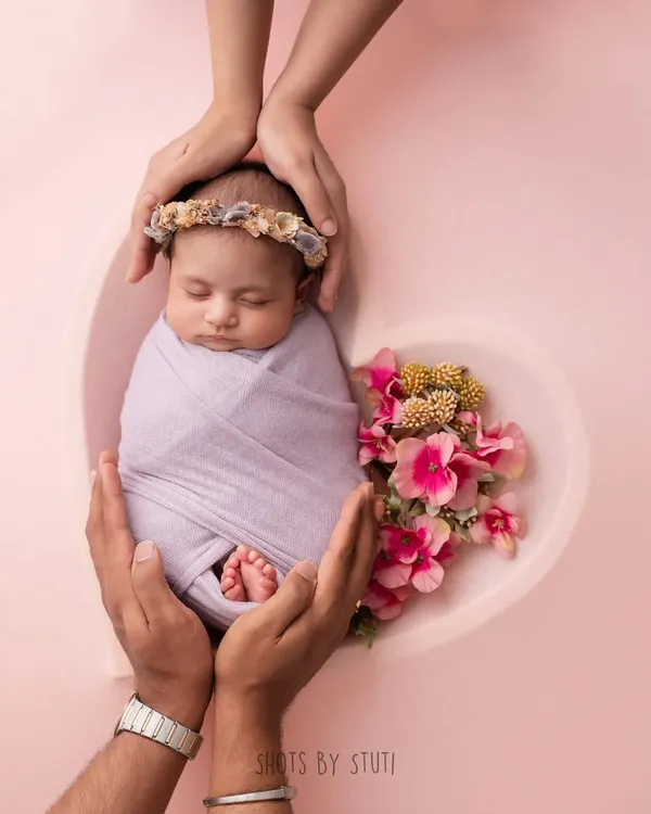 This is where the magic begins. I love creating artistic, beautifully styled portraits that turn a fleeting moment with your newborn into a timeless piece of art. This heart bowl setup is just one of many creative concepts we can explore for your baby's first photoshoot.