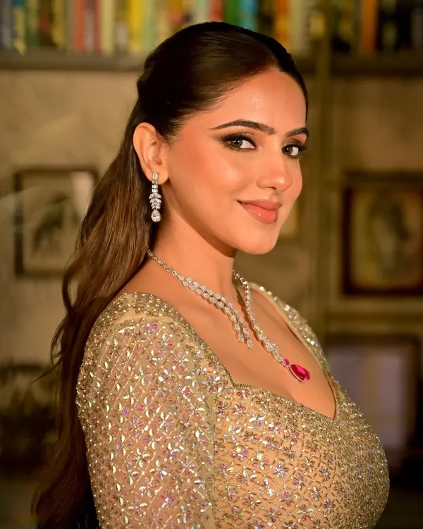 This is the look that defines modern bridal elegance. I focused on creating a flawless, glowing base that looks like real skin, paired with softly sculpted features and sophisticated, shimmering eyes. It’s a powerful yet understated glam that lets her natural beauty radiate.