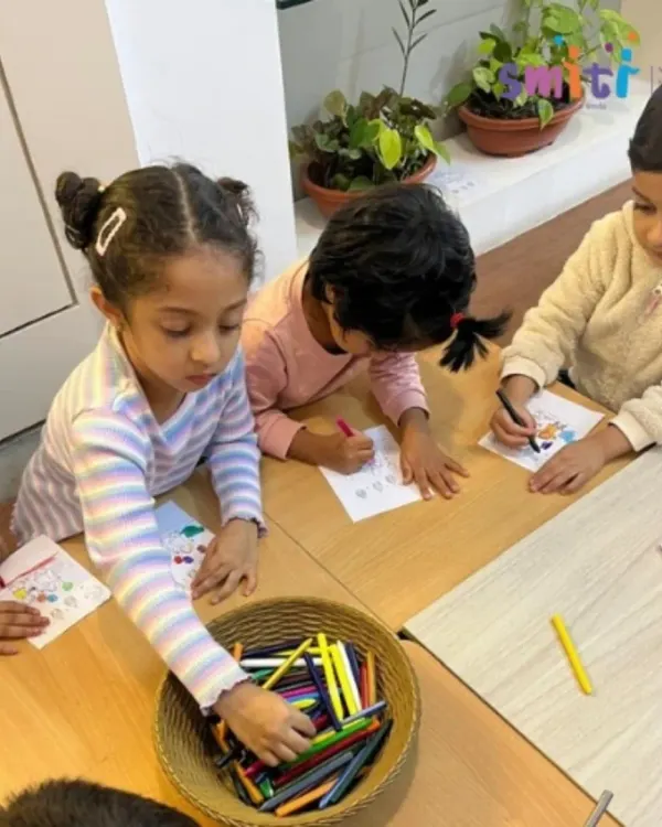 Children are deeply focused on a coloring activity for Eid Milad-un-Nabi. Art is a wonderful medium for them to learn about and express the spirit of different cultural celebrations.