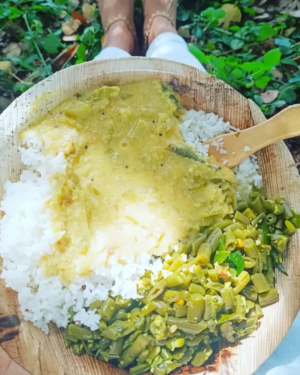 A simple, nourishing meal of rice, vegetables, and legumes served on a leaf plate at the Isha Yoga Center. Eating in this way, close to nature, makes you more sensitive to the food you consume and how it affects your system. It is a practice in mindfulness itself.
