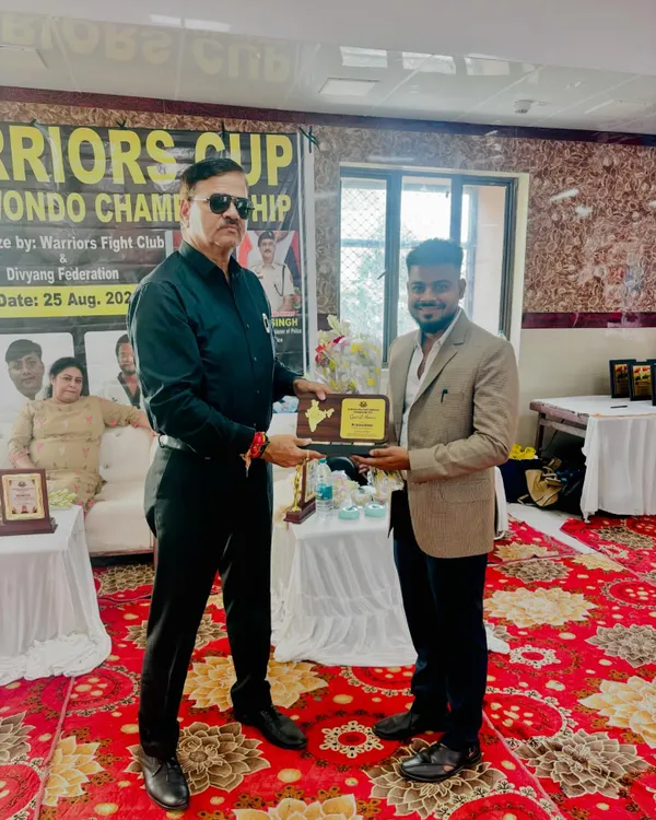 With IPS Officer Jitender Mani. Collaborating with law enforcement helps me ensure my training is relevant and effective for real-world safety.