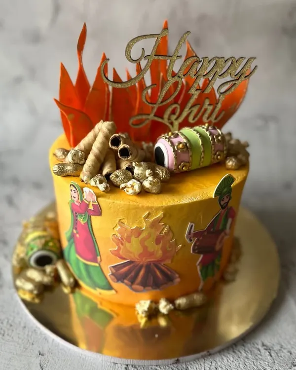 Bringing the warmth of the bonfire to your dessert table. This custom Lohri cake is decorated with edible flames, peanuts, and traditional Punjabi motifs.