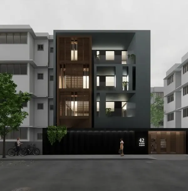 This is the full street-view rendering for 'Project 42', a bungalow refurbishment in Mumbai. The design contrasts a dark, solid base with a lighter, articulated upper facade featuring wood screens, creating a distinct modern identity in a traditional neighborhood.