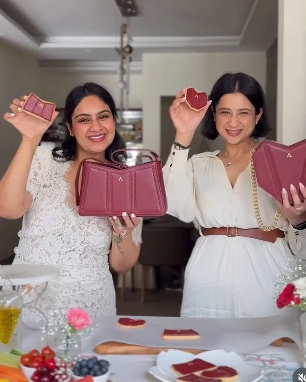 This is us, a mother-daughter team, celebrating a wonderful collaboration! We created custom cookies shaped exactly like the brand's beautiful handbags for their Mother's Day campaign. It's our joy to bring a brand's vision to life in the sweetest way possible.