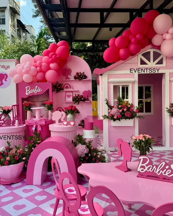 I brought the iconic Barbie dreamhouse to life for this all-pink birthday bash, complete with a life-sized playhouse, themed flooring, and custom seating for the kids.