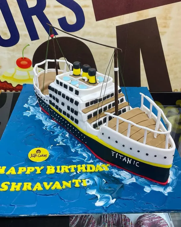 A true showstopper, this custom 4kg cake is sculpted to look like the Titanic ship, complete with detailed decks, funnels, and railings, sailing on a sea of blue icing. This is an example of how we can turn any passion into a spectacular, edible 3D centerpiece for your celebration.