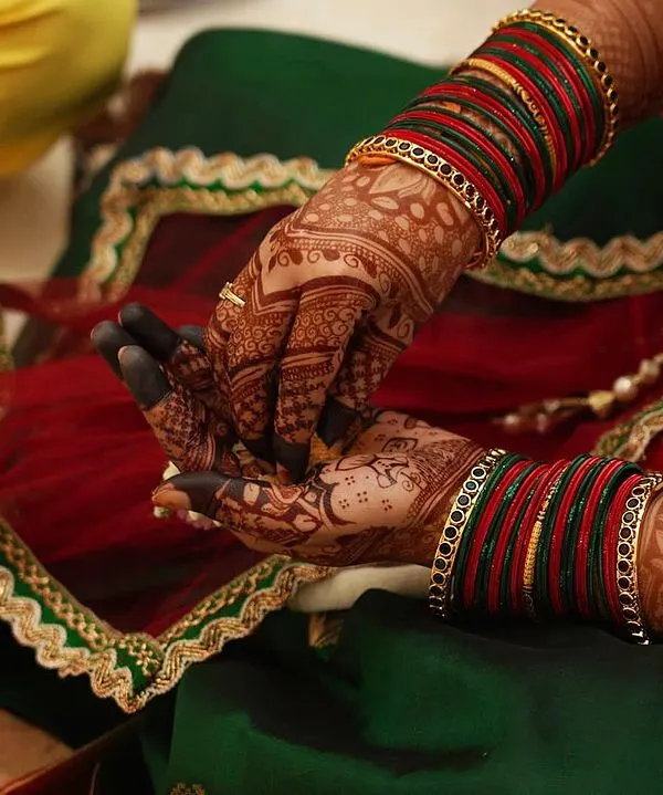 The final stain is just as important as the design itself. We use all natural henna to achieve this deep, rich reddish brown color that looks stunning in wedding photos.