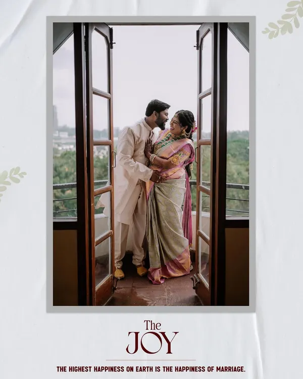 A beautiful, soft-lit portrait of a couple sharing an intimate moment on a balcony.