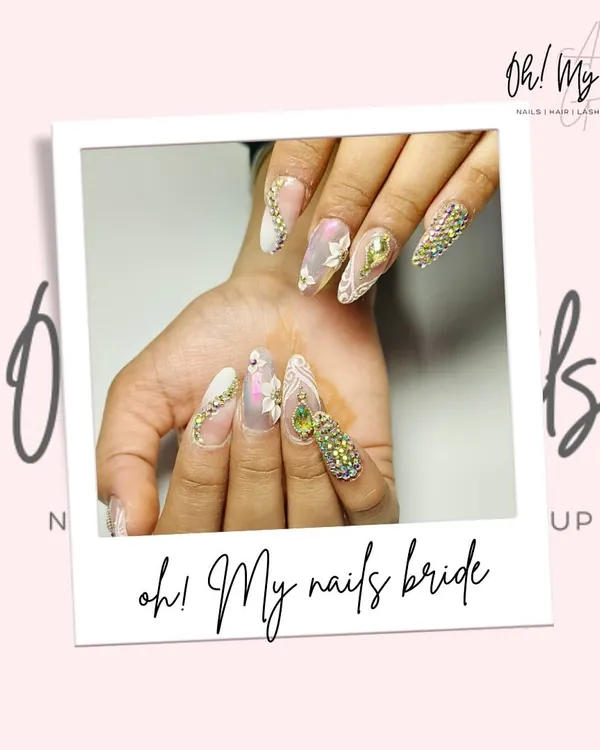 The ultimate bridal fantasy. This set features intricate white lace detailing, 3D floral accents, and a full nail covered in dazzling crystals for a truly show-stopping wedding day look.