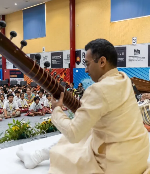 A lecture-demonstration in progress for students at Ramagya School, organized by SPIC MACAY. My goal in these sessions is to make Indian classical music accessible and engaging for young listeners, explaining the structure of Raags and Taals in an interactive format.