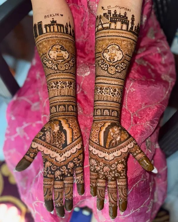 This bridal design tells a love story that traveled from Berlin to Mumbai. I incorporated the skylines of both cities, along with the couple's portraits, to create a truly personal piece of art for the bride's special day.