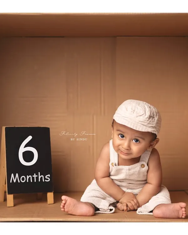 Celebrating six months with a fun 'in the box' setup. This is a wonderful way to mark a half-birthday milestone with a creative twist.